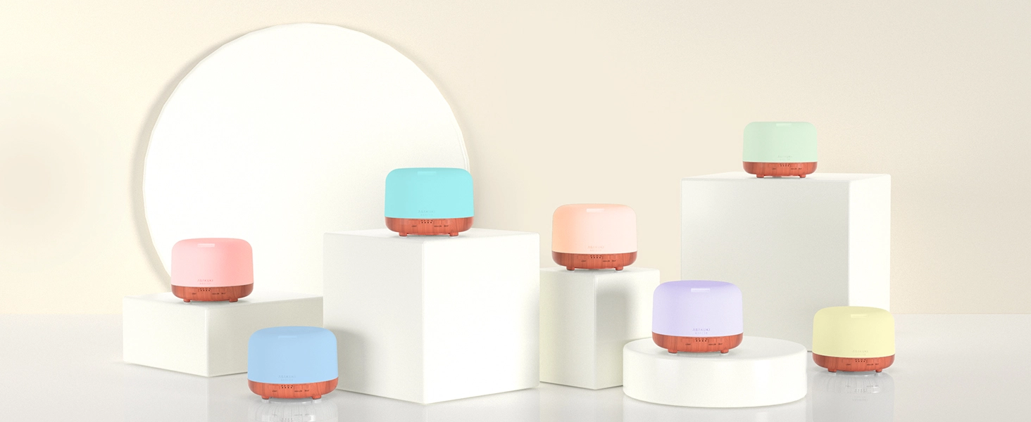 Series of white circular portable lamps with colored accent bands shown in different configurations and lighting states on neutral backgrounds.