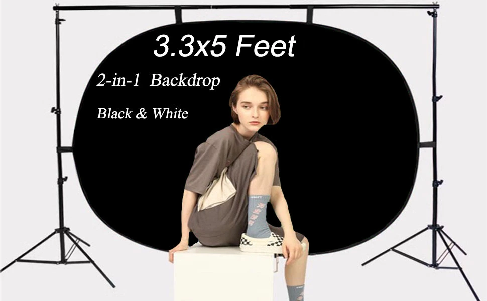 Portable photography backdrop stand with 3.3x5 feet black and white reversible backdrop. Stand supports oval-shaped backdrop, demonstrating size and setup for studio use.